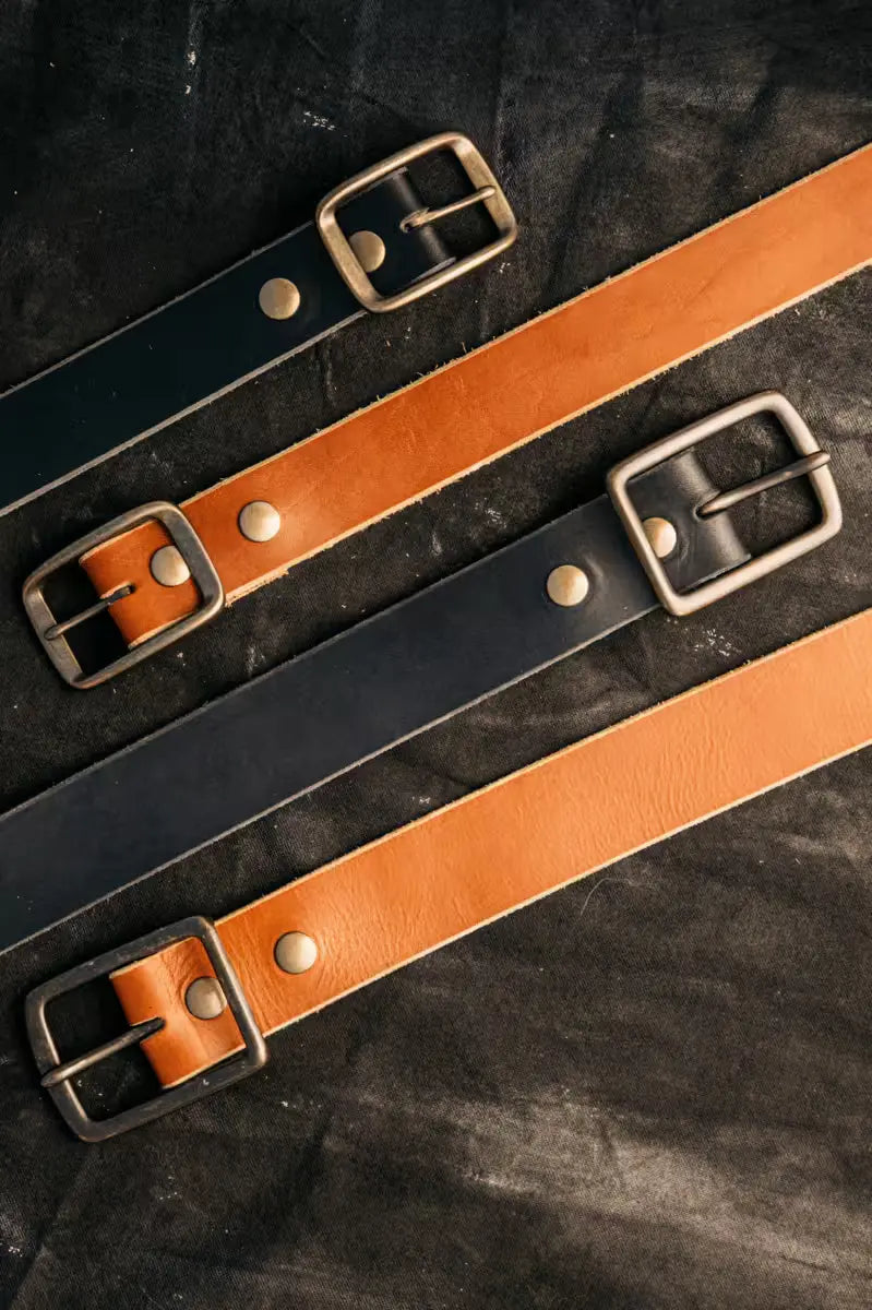 High-quality Black and Brown 8oz American Latigo leather belts in 1.7” width with brass buckles and rivet details