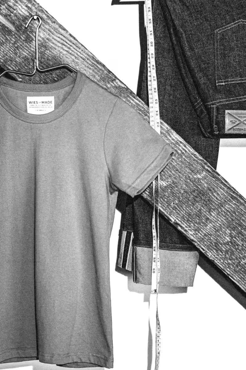 Bolinas Tee for men made of heavyweight 8oz 100% cotton, displayed with a black and white filter alongside denim and measuring tape