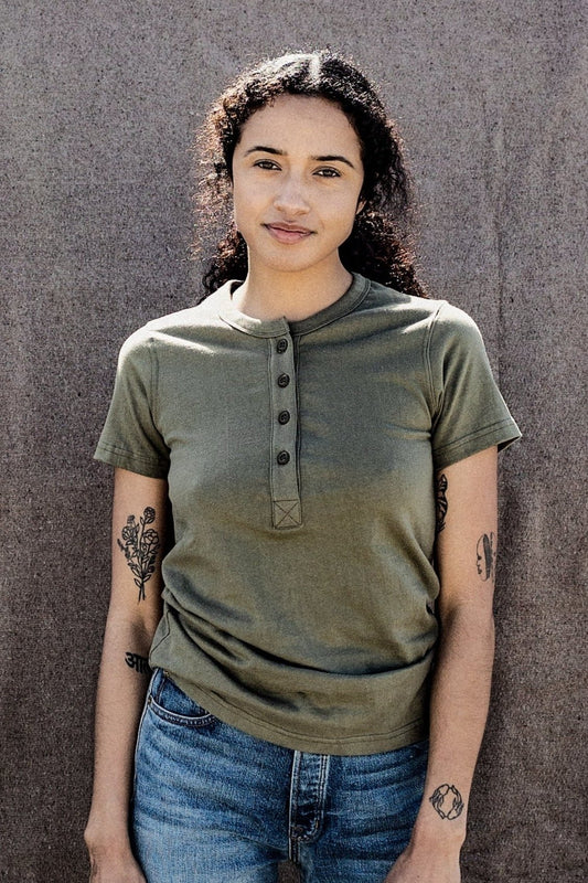 woman wearing olive tee