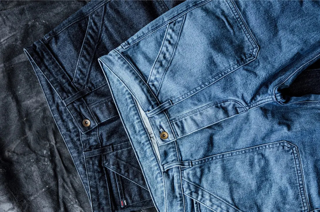 Best jeans brands for women featuring two stylish denim pairs in dark and light blue shades.