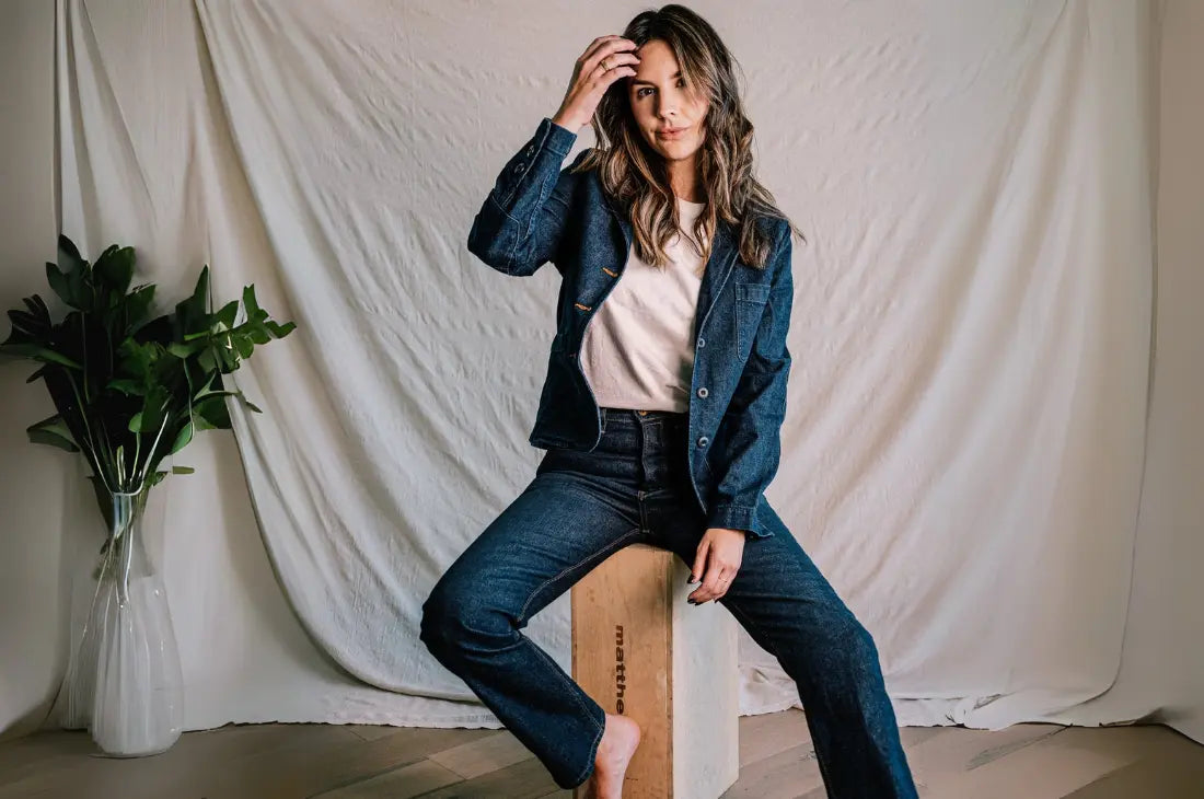 Casual denim blazer paired with matching jeans and a white t-shirt, creating a relaxed yet stylish outfit.