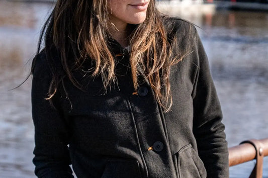 French terry fabric jacket worn outdoors with button-up closure and soft texture