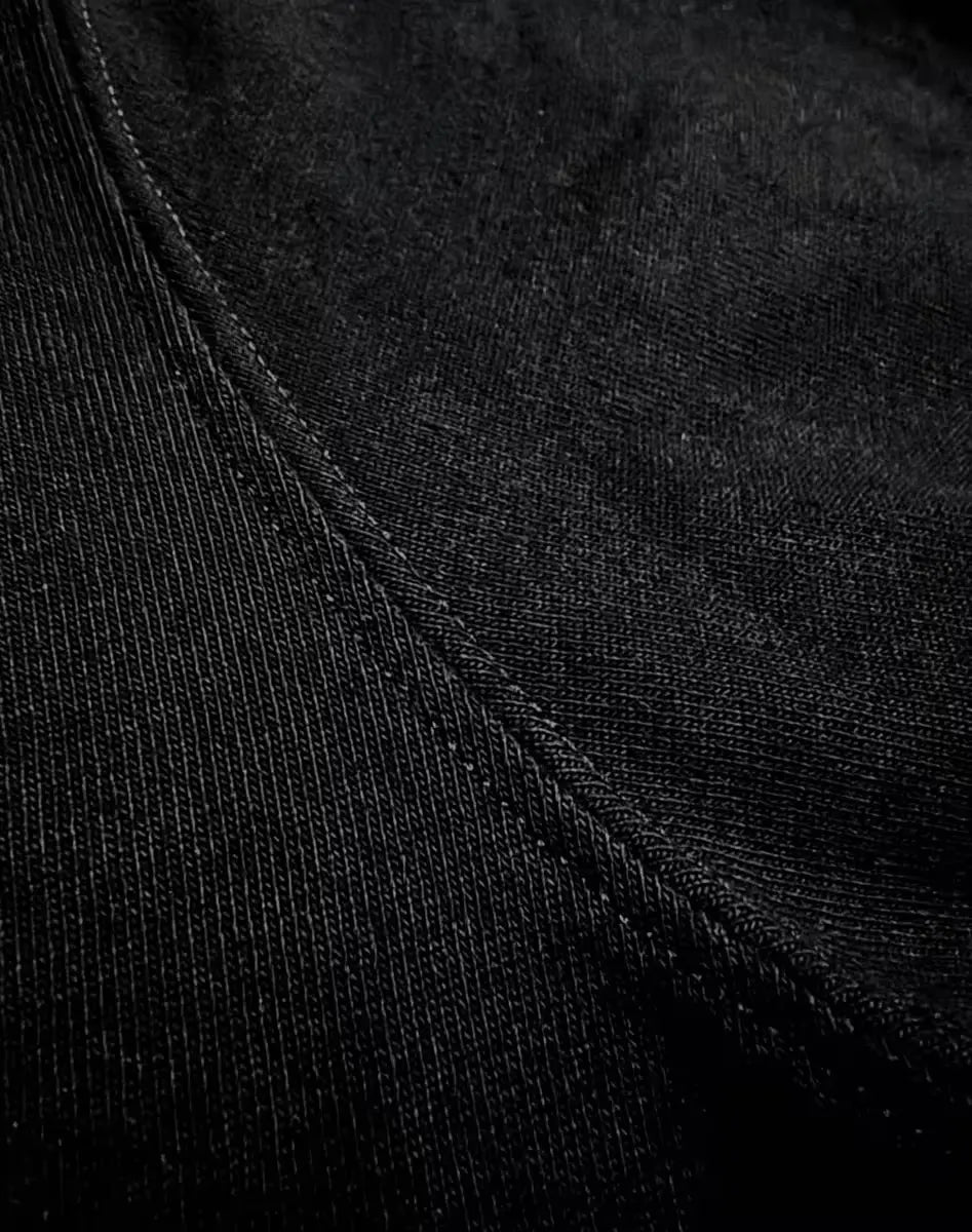 Heavyweight basalt-colored Reyes Henley made of 8oz 100% cotton fabric with detailed stitching