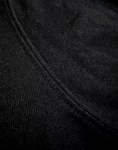 Heavyweight basalt-colored Reyes Henley made of 8oz 100% cotton fabric with detailed stitching